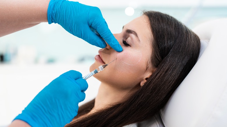 Dermal fillers facial injection treatment